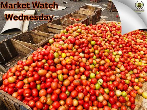 Tomatoes packed in wooden crates at market